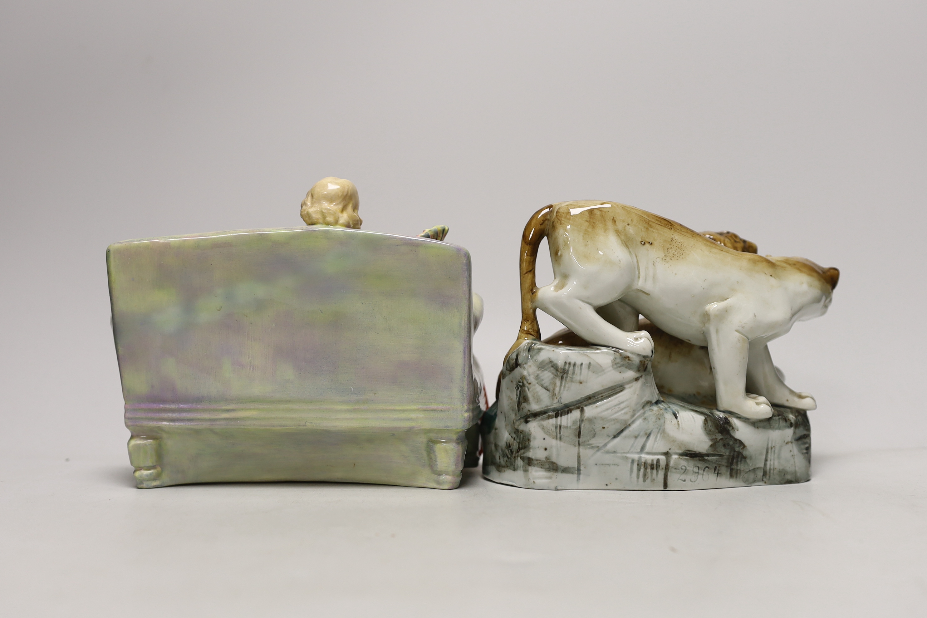 A Royal Doulton figure 'Sweet and Twenty' HN1298 and a continental porcelain lion and lioness group, marked 2964